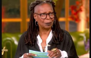 Whoopi Goldberg, The View controversy, Whoopi Goldberg Trump comments, Whoopi tears note on air, live TV drama, daytime talk show news, political commentary debate, Whoopi clarifies remarks, celebrity news update, TV host reactions, hot topics The View, Whoopi Goldberg viral moment, Trump discussion on The View, entertainment news, television trending moments